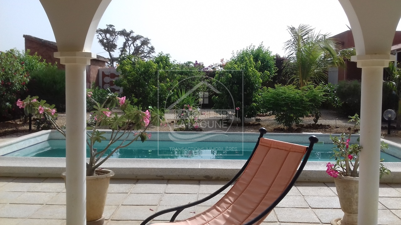 Agence Immobilière Saly Sénégal - V2075 - Villa à NGAPAROU - V2075 Villa avec piscine à vendre à Ngaparou Sénégal