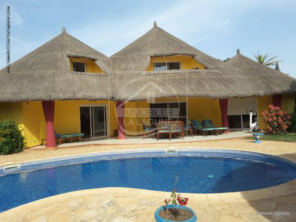 Agence Immobilière Saly Sénégal - V2214 - Villa à NGUERIGNE - V2214-vila-a-acheter-avec-piscine-a ngieringne-senegal