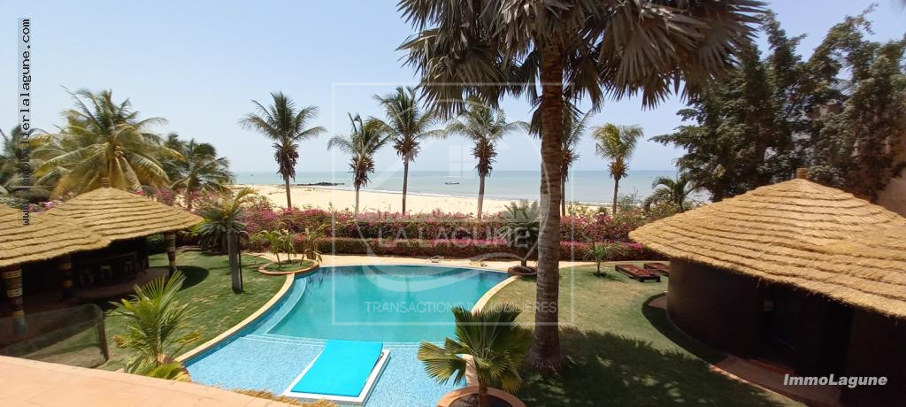Agence Immobilière Saly Sénégal - V2774 - Villa à NGAPAROU - V2774-villa-a-vendre-a-ngaparou-senegal-bord-de-mer-avec-piscine