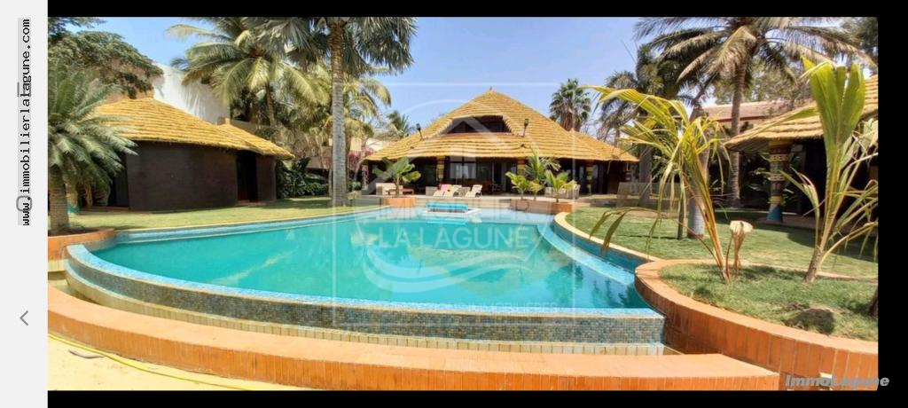 Agence Immobilière Saly Sénégal - V2774 - Villa à NGAPAROU - V2774-villa-a-vendre-a-ngaparou-senegal-bord-de-mer-avec-piscine